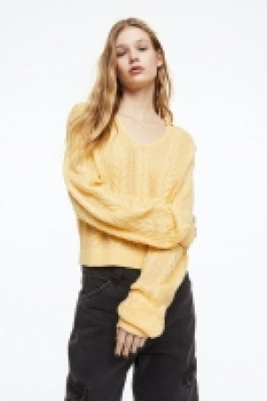 HM  Pull en maille torsadée avec col