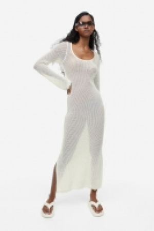 HM  Robe à maille ajourée avec détail noué