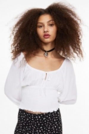 Blouse smockée 8.99 €