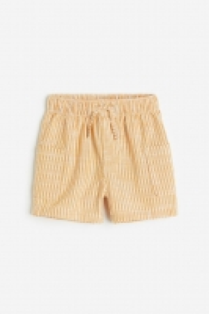 HM  Short avec poches plaquées
