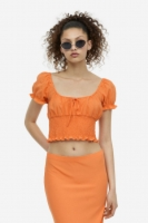 Blouse smockée avec manches bouffantes 4.99 €