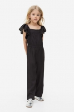 HM  Combi-pantalon avec broderie anglaise