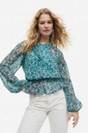 Blouse avec ouvertures