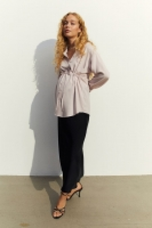 HM  MAMA Blouse avec ceinture à nouer