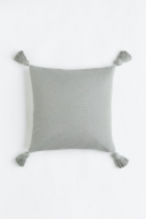 Housse de coussin à pompons 9.99 €